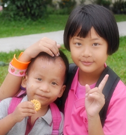 The blind students will be performing for the picnickers.